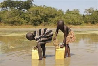 Children Fetching Clean Water from Carter Center filtered ponds